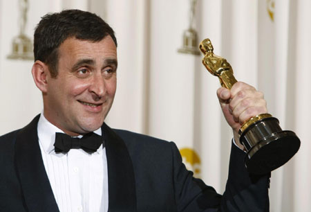 O'Connor holds his Oscar for achievement in costume design for 