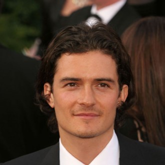 Orlando Bloom moving in with model