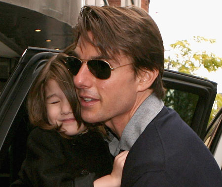 Tom, Katie & Suri leaving the theatre in Melbourne