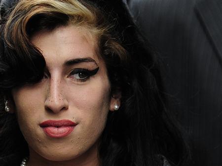 Winehouse denies assault, says 