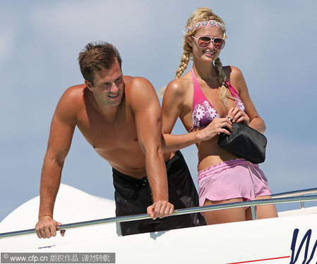 Paris Hilton and Doug Reinhardt play in the Ocean