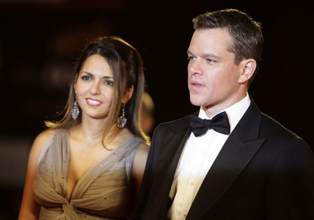 Matt Damon and his wife walk on the red carpet at the 66th Venice Film Festival