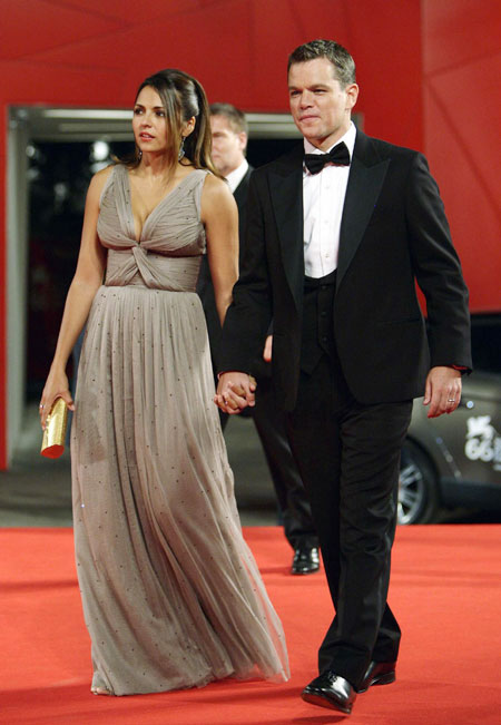 Matt Damon and his wife walk on the red carpet at the 66th Venice Film Festival