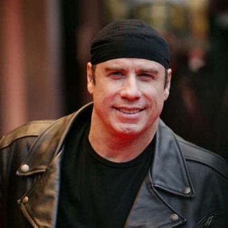 John Travolta holds family 'tighter'