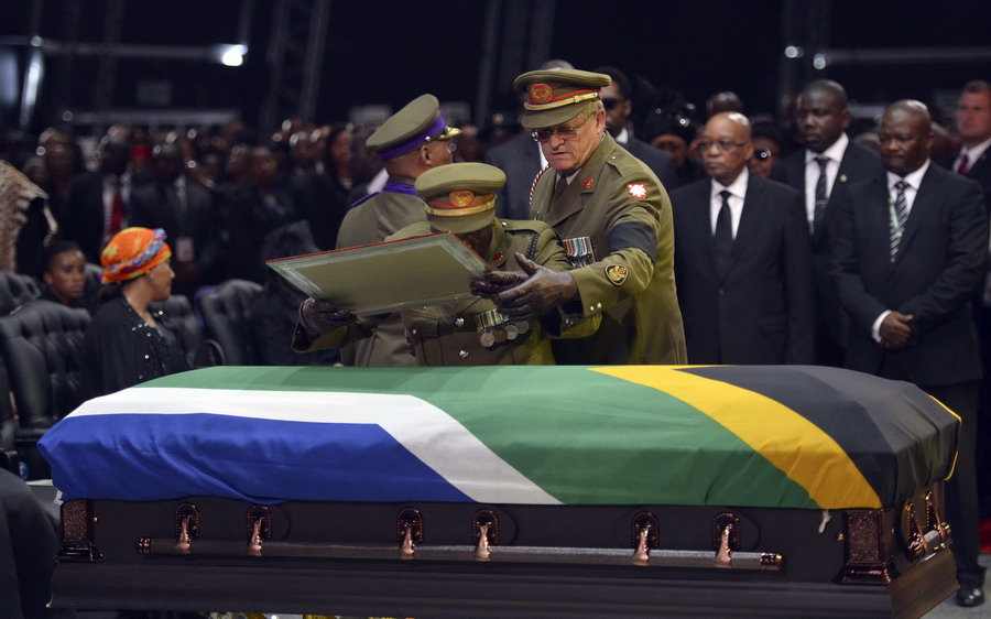 With a hole in its heart, South Africa buries Mandela