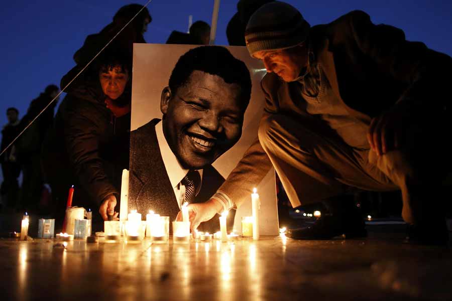 With a hole in its heart, South Africa buries Mandela