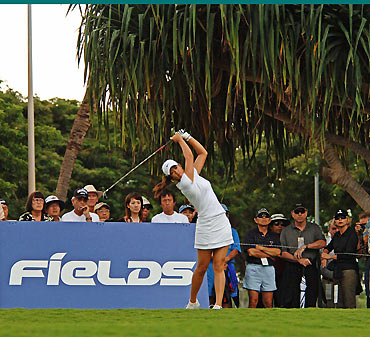 Michelle Wie of Honolulu, Hawaii, tees off on the 11th hole during Round 2 of the Fields Open at the Ko Olina Golf Club, on the island of Oahu, in Kapolei, Hawaii February 24, 2006. [Reuters]