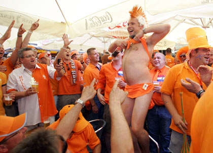 Dutch soccer fans celebrate the victory of their team in the World Cup soccer match against Serbia and Montenegro in Leipzig, June 11, 2006. 