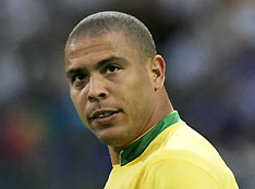 Brazil's Ronaldo walks on the pitch during their Group F World Cup 2006 soccer match against Japan in Dortmund June 22, 2006. 
