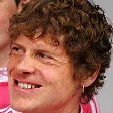 T-Mobile cyclists Jan Ullrich of Germany (R) and Oscar Sevilla of Spain smile during the presentation of the T-Mobile cycling team 2006 in Santanyi, Mallorca in this January 14, 2006 file photo.