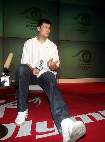 NBA Houston Rockets player Yao Ming speaks at a press conference for the 2007 Special Olympics in Beijing July 21, 2006. Yao has declared his foot injury a non-issue ahead of August's World Championship warm-up games against America and Brazil. 