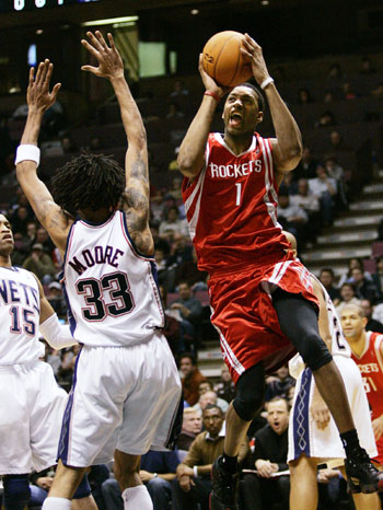 T-Mac, Yao help Rockets to rout of Nets