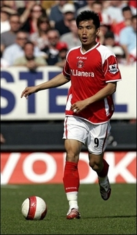 Zheng Zhi of Charlton United Footbal Club makes a break for the Sheffield United Football Club goal during a Premiership match at The Valley Football Ground, 21st April.