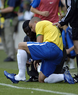 Ronaldo limps off during Brazil win
