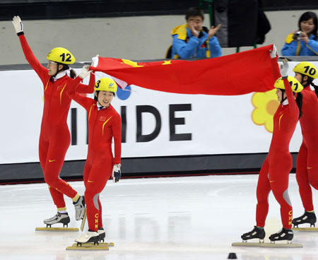 Roses on ice clinces gold in Turin