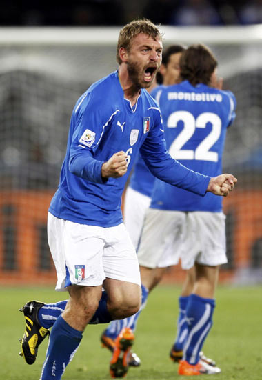 Defending champions Italy held 1-1 tie with Paraguay