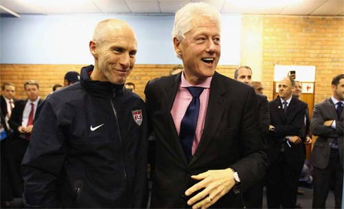 Changing room visitor Clinton praises US spirit