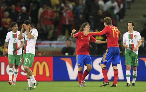 Spain bypass Portugal to reach last eight