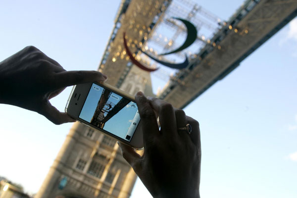 Paralympics logo hangs on Tower Bridge in London