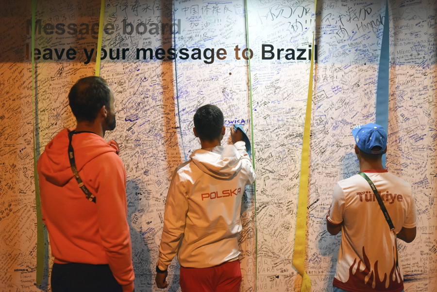 Rio Olympic Village: Flags, athletes and samba