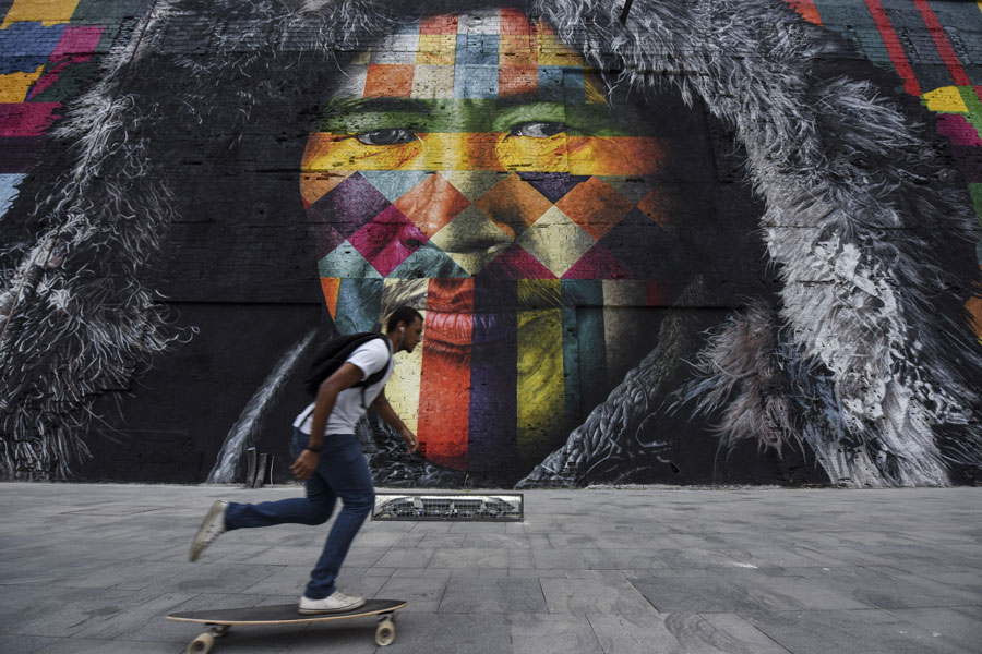 Murals of indigenous people adorn Olympic Boulevard in Rio