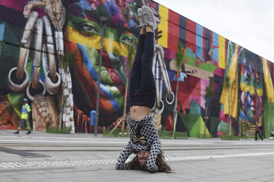 Murals of indigenous people adorn Olympic Boulevard in Rio