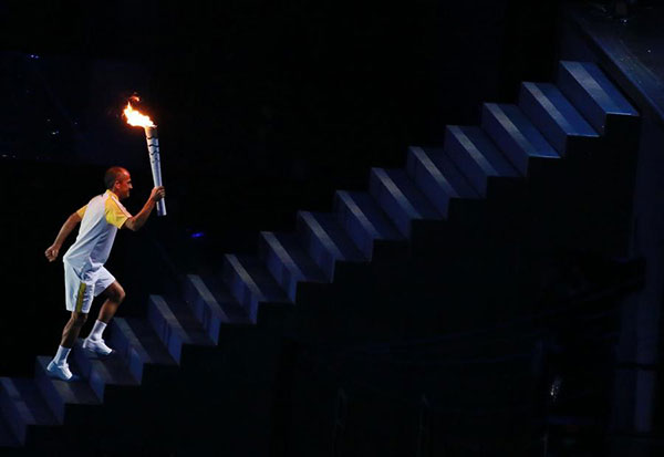 Brazilian marathon runner lights Olympic cauldron