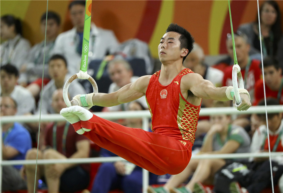 Chinese gymnasts win bronze in men's final, Japan crown