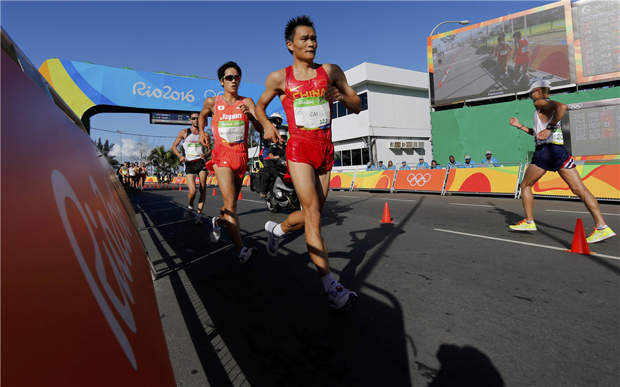 Wang Zhen wins men's 20km racewalking gold 