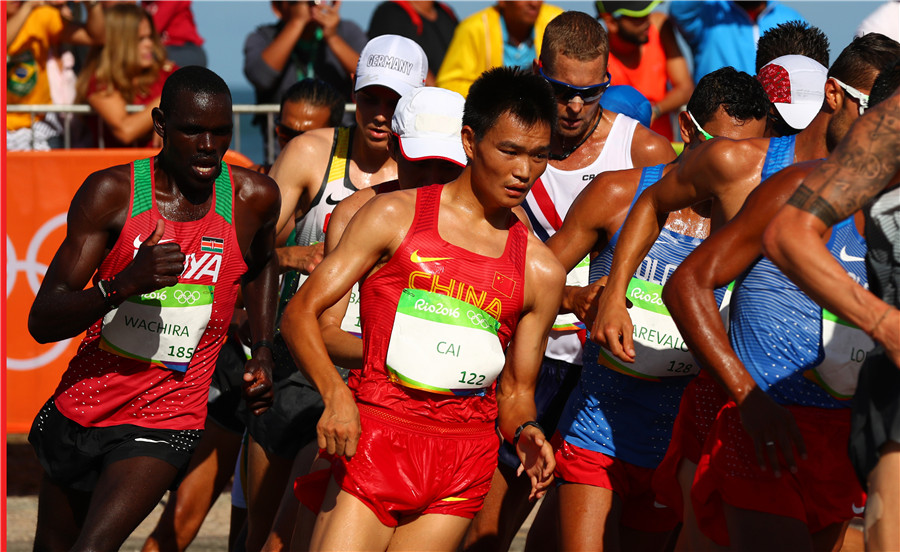 Wang Zhen wins men's 20km racewalking gold 