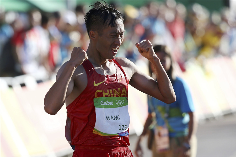 Wang Zhen wins men's 20km racewalking gold 