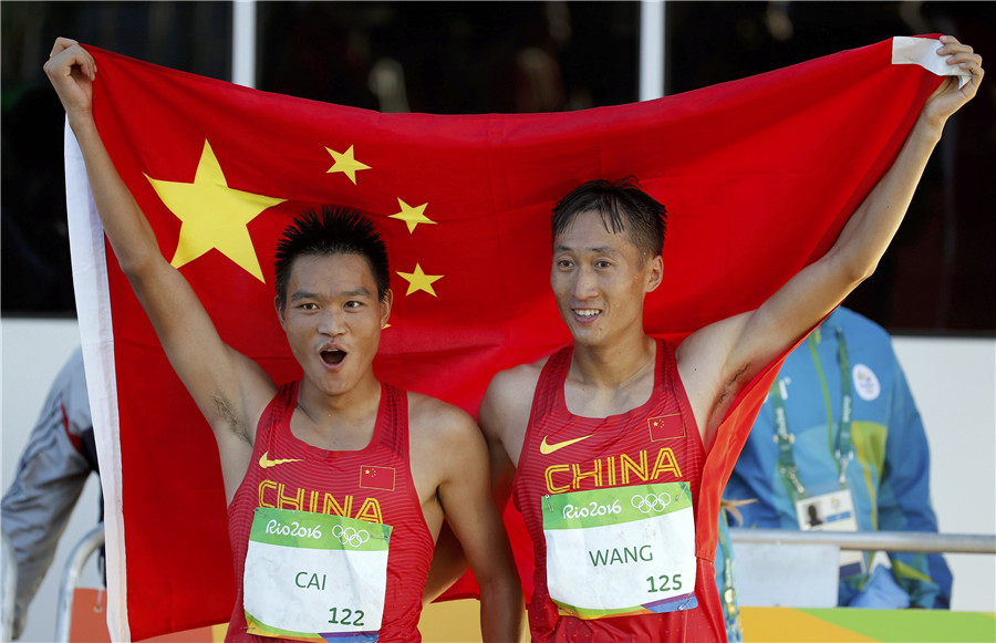 Wang Zhen wins men's 20km racewalking gold 