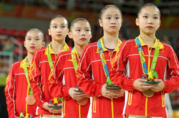 Tough, poor gymnast Shang sheds tears after losing out on medal
