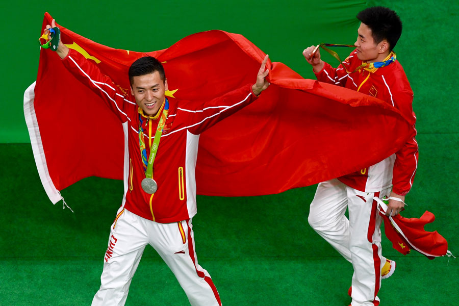 China's Dong and Gao take silver, bronze in men's trampoline