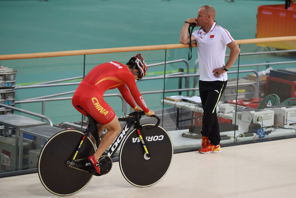 China wins first cycling Olympic gold, owes glory to French coach