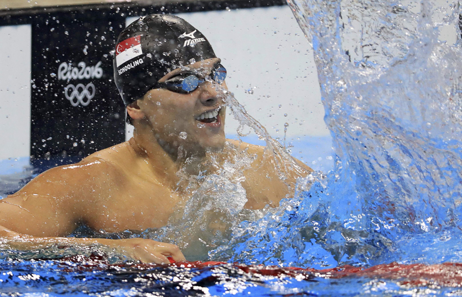 Asian power edges Phelps, China's Li edged to settle for 5th