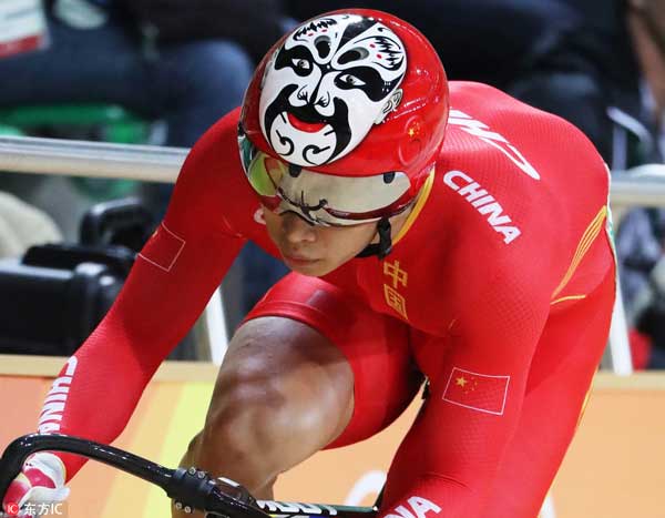 Peking Opera faces spotted on cyclists' helmets in Rio