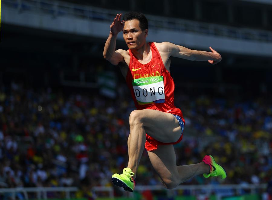 China's Dong Bin wins triple jump bronze