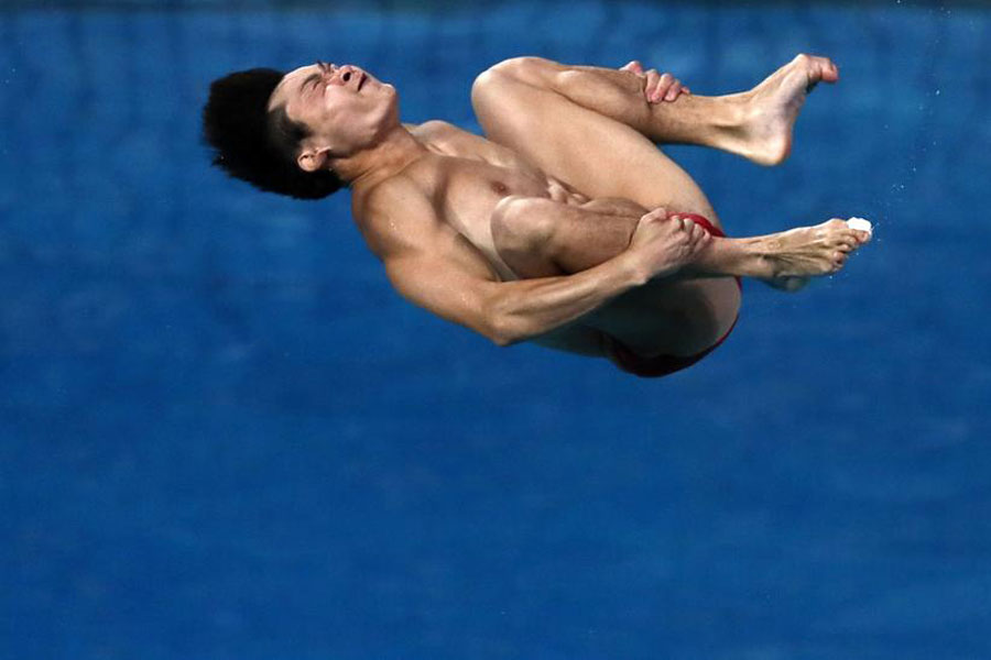 China's Cao Yuan makes up for synchronized loss with individual gold