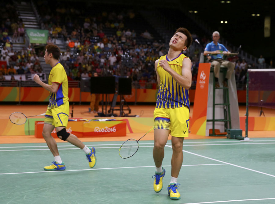 China defeats Malaysia for men's doubles gold in badminton