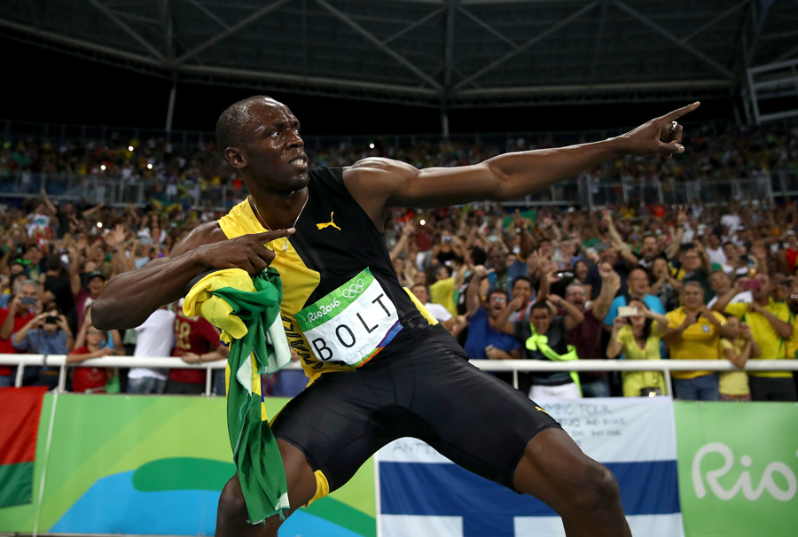 Usain Bolt accomplishes triple hat-trick