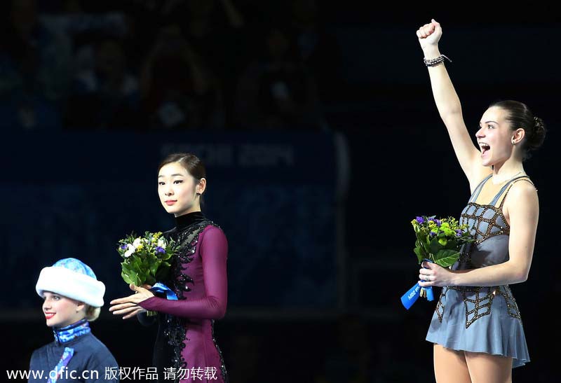 Russian stuns Kim to win dramatic figure skating gold