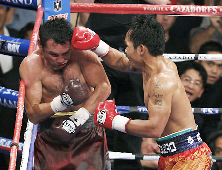 Pacquiao stuns 'Golden Boy' De La Hoya with 8th-round TKO