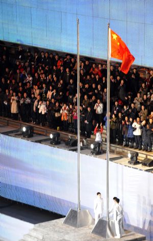 Chinese national flag is raised at the beginning of the opening ceremony of the 24th World Winter Universiade at Harbin International Conference, Exhibition and Sports Centre Gym in Harbin, capital of northeast China&apos;s Heilongjiang Province, Feb.18, 2009. (Xinhua/Guo Dayue)