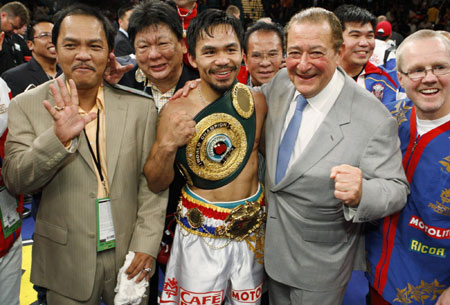 Filipino Pacquiao beats down British boxer