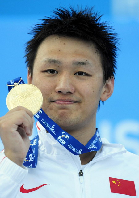 Zhang wins China's first ever men's gold at swimming worlds