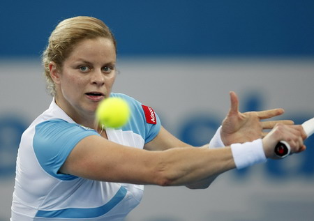 Clijsters sets up Henin final in Brisbane