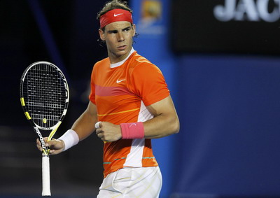 Nadal breezes past lacklustre Lacko