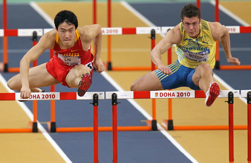 Liu Xiang competes in hurdles heats in Doha