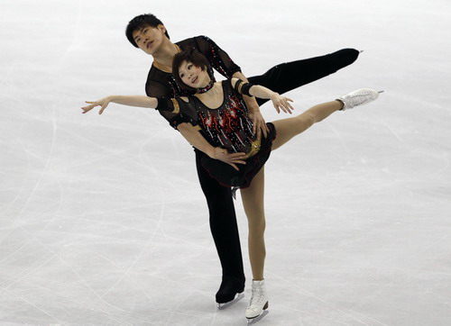 Pang/Tong win gold at World Figure Skating Championships